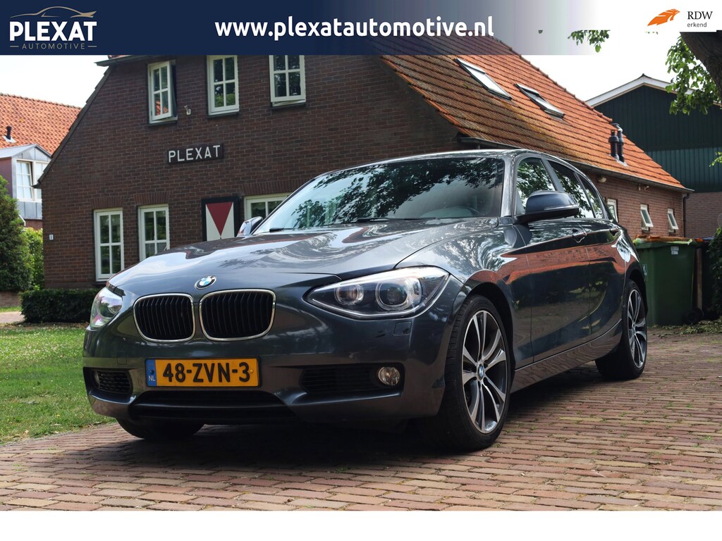 BMW 1-Serie 118i Upgrade Edition Aut. | Xenon | Lederen Stoelen | Airco | Navigatie | 17 Inch | Historie | Cruise control |