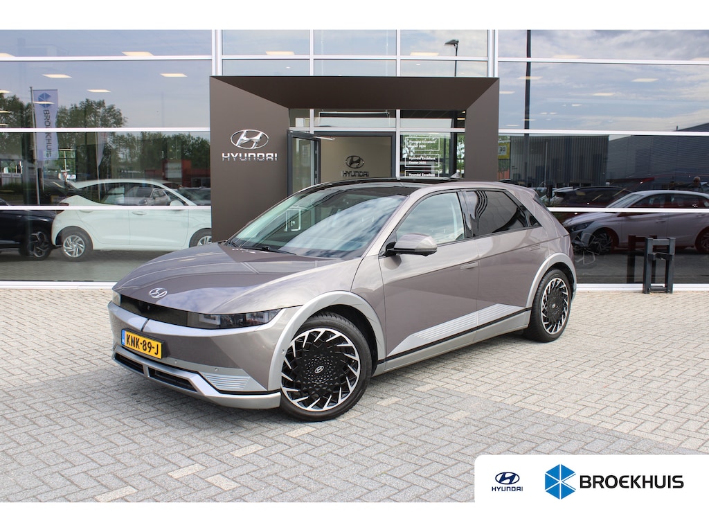 Hyundai Ioniq 5 Lounge 73kWh | Elektrisch verstelb. voorstoelen met geheugen | Rondomzicht graden camera | Panoramadak | Head-up display | Achterstoelen verwarmd | Armsteun voor | Bots waarschuwing systeem
