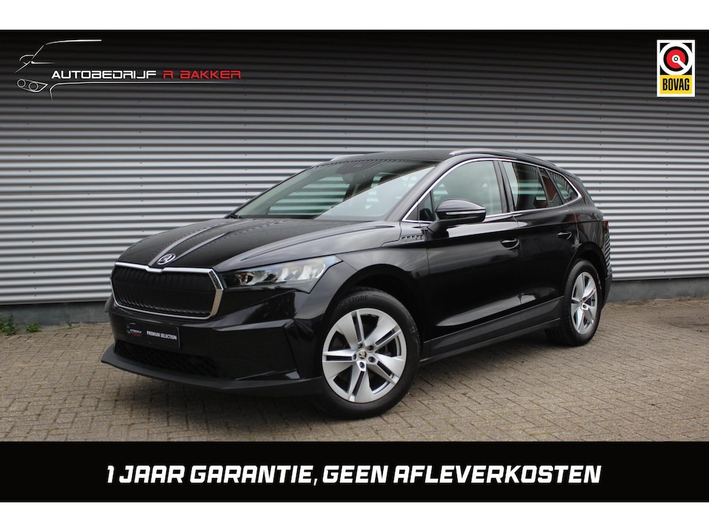 Skoda Enyaq iV 80 Loft // 99% SoH | Dealeronderhouden, 1e eigenaar | Warmtepomp | Camera | Sfeerverlichting | Adap. cruise control | CarPlay & Android Auto