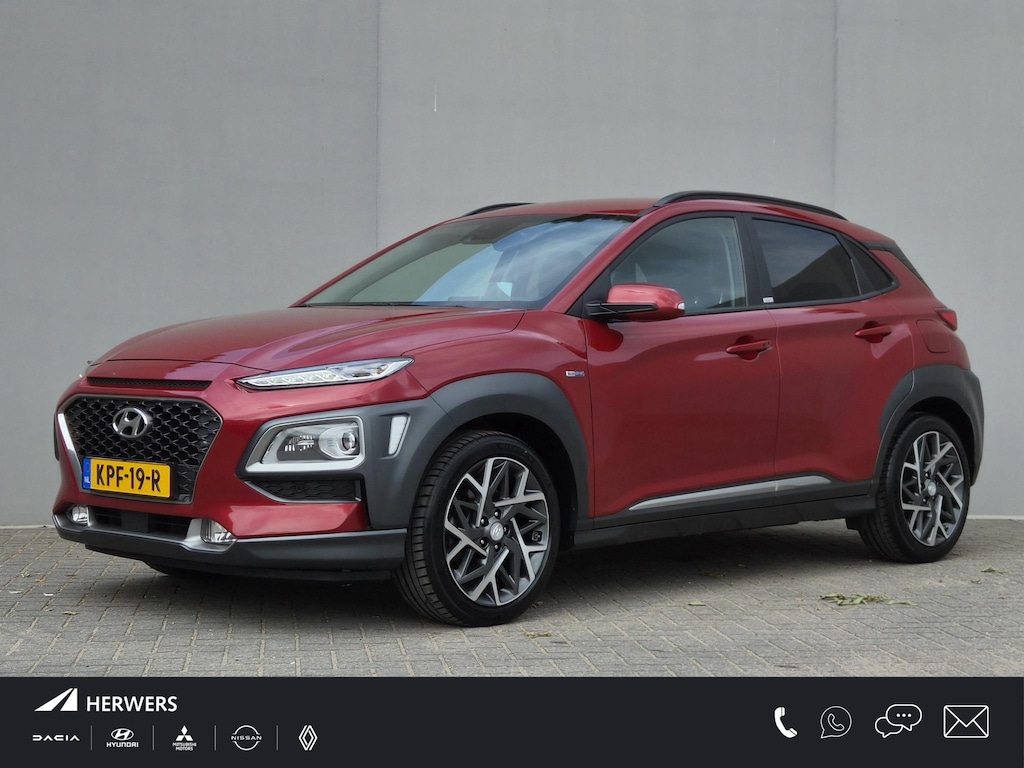 Hyundai Kona 1.6 GDI HEV Premium / Dealer onderhouden / Head Up Display / Adaptief cruise control / Achteruitrijcamera / Trekgewicht 1300 kg / Stuur- & Stoelverwarming / Stoelventilatie / Keyless Entry/Start / Krell audio systeem / Draadloze telefoon lader /