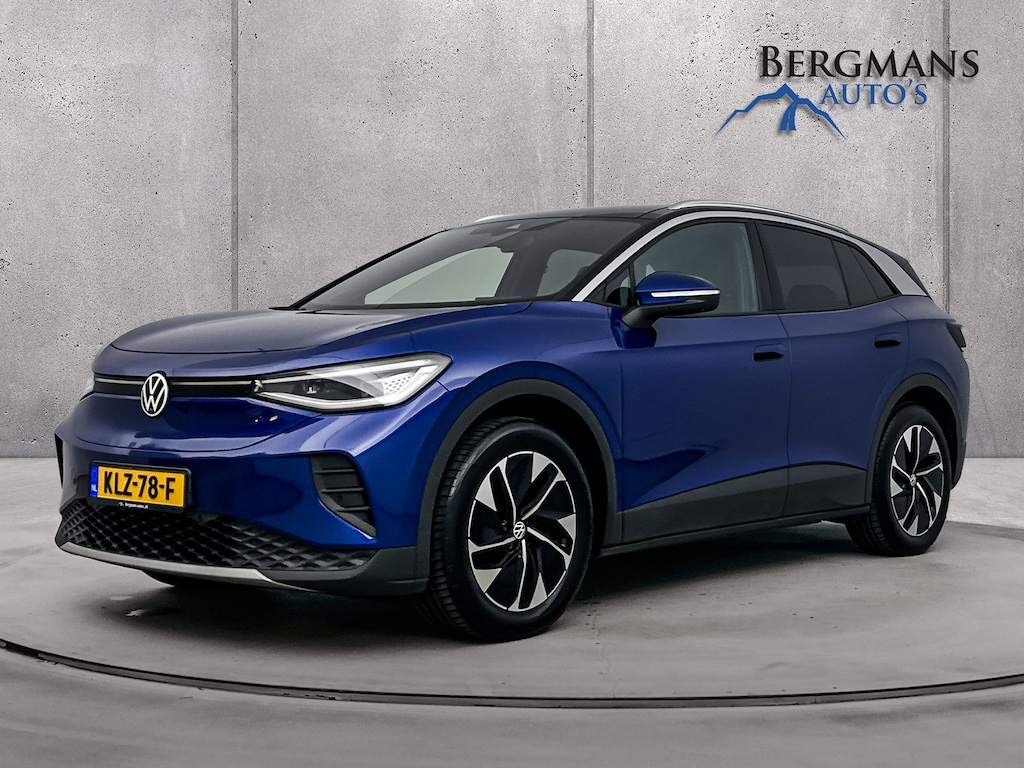 Volkswagen ID.4 - Pro Business 77 kWh // VOORRUIT VERWARMING // PANO // E-ACHTERKLEP //