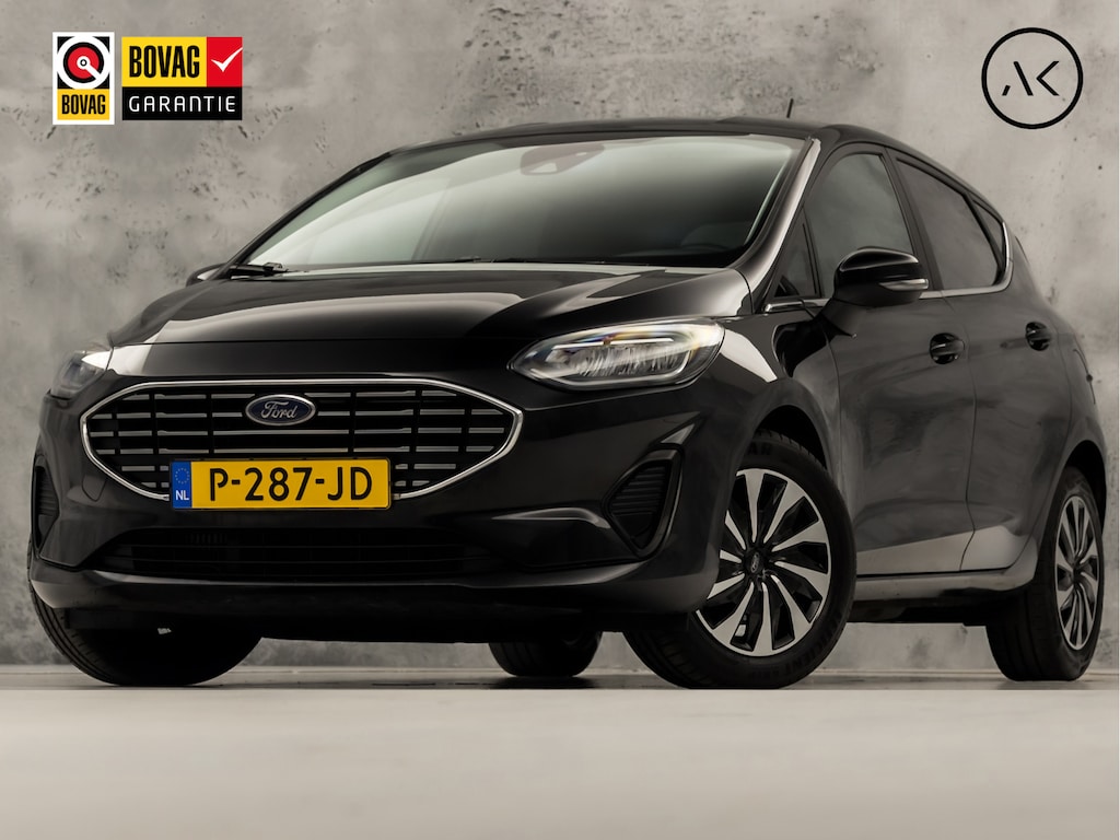 Ford Fiesta 1.0 EcoBoost Titanium Sport (APPLE CARPLAY, GROOT NAVI, CLIMATE, GETINT GLAS, PARKEERSENSOREN, SPORTSTOELEN, LM VELGEN, CRUISE, NIEUWSTAAT)