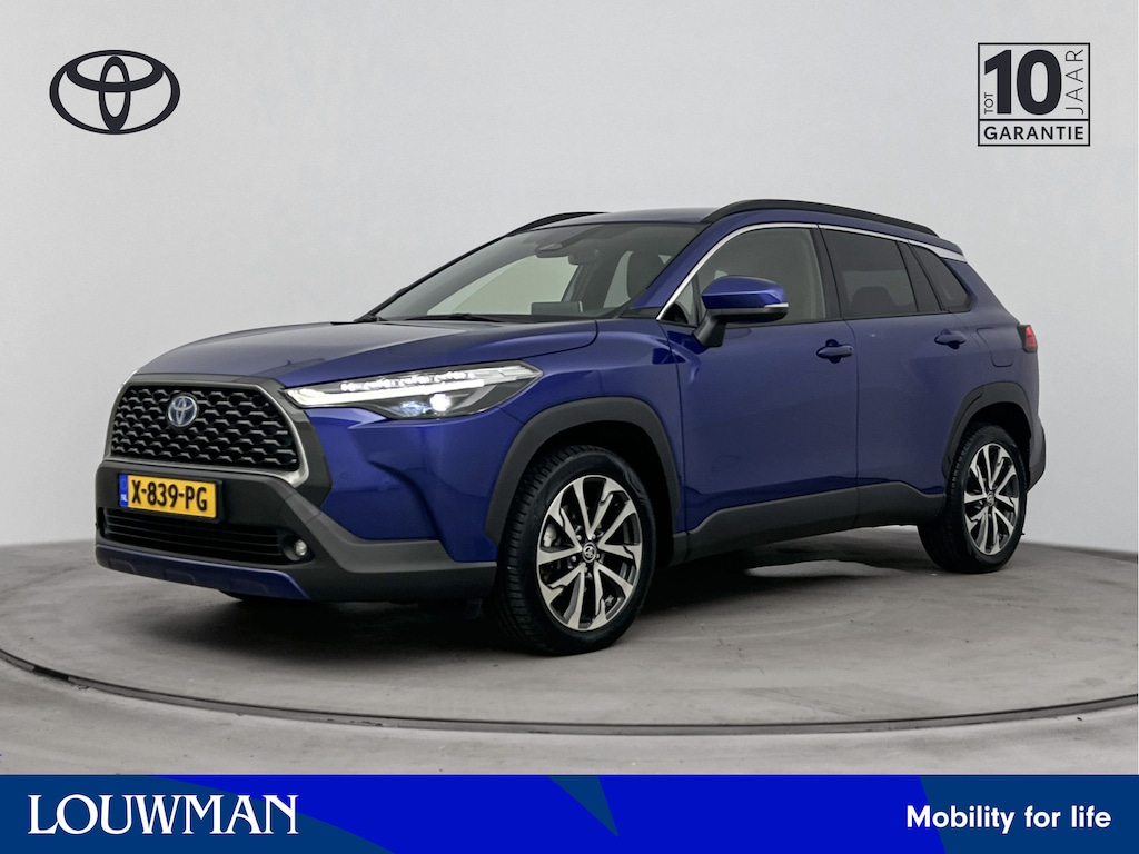 Toyota Corolla Cross Hybrid 140 Business Plus | Dodehoek detectie | Stoelverwarming | Parkeersensoren voor+achter | Elektrische achterklep | Draadloze telefoonlader | Half lederen bekleding | Rijklaar