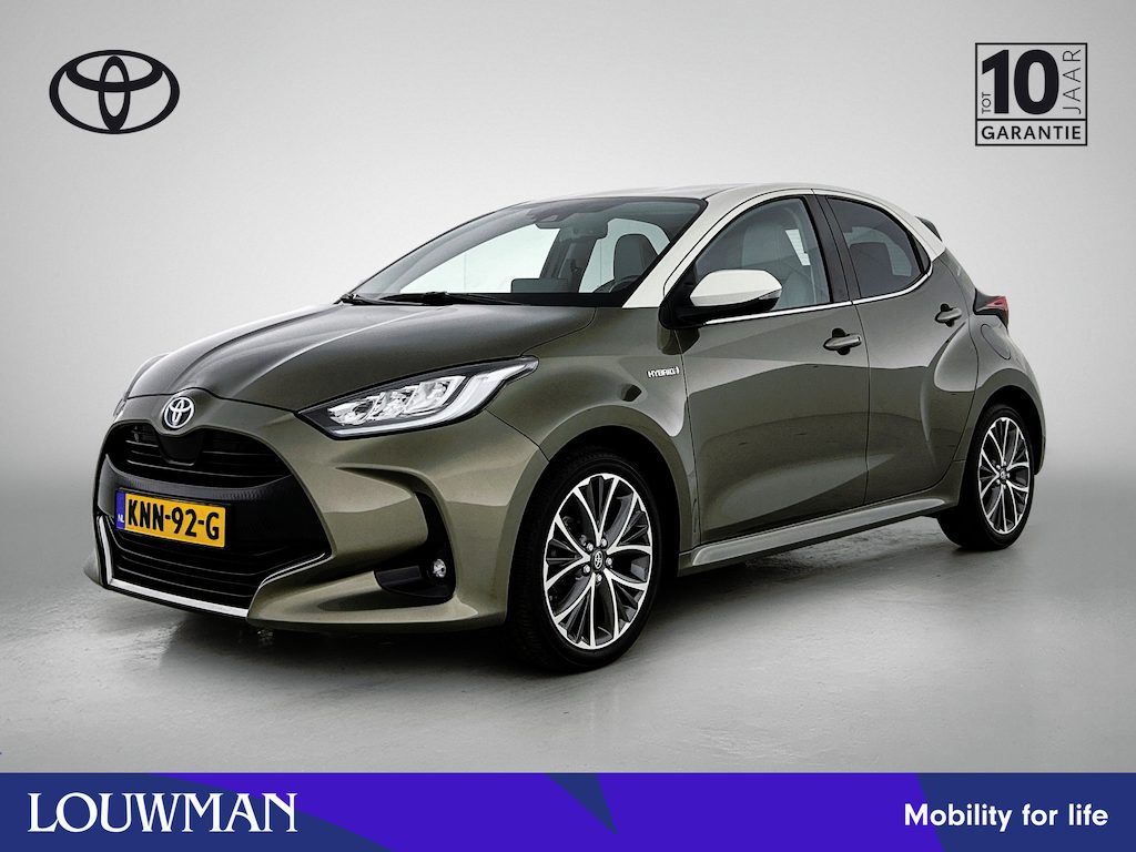 Toyota Yaris 1.5 Hybrid Style + | Dealer onderhouden | Lichte kleur half lederen interieur | Stoelverwarming | Climate Control | Cruise Control Adaptive | achteruitrijcamera |