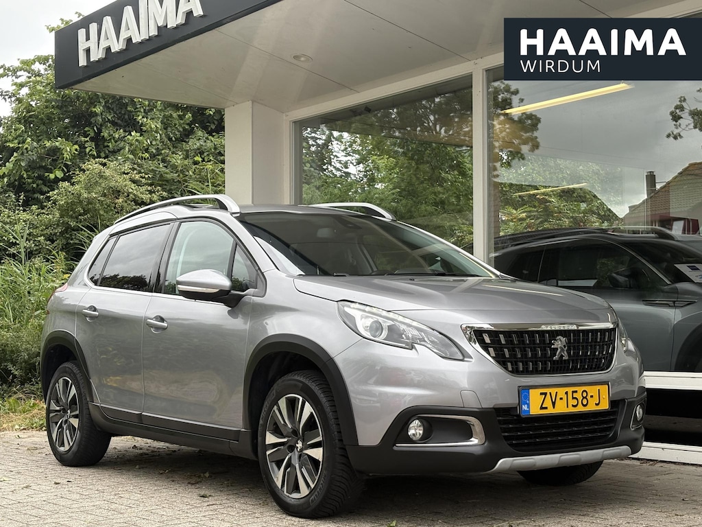 Peugeot 2008 1.2T 130pk Allure | Achteruitrijcamera | Climate Control | Nette staat | Apple Carplay/Android Auto | Privacy Glass | Half lederen bekleding | Navigatie