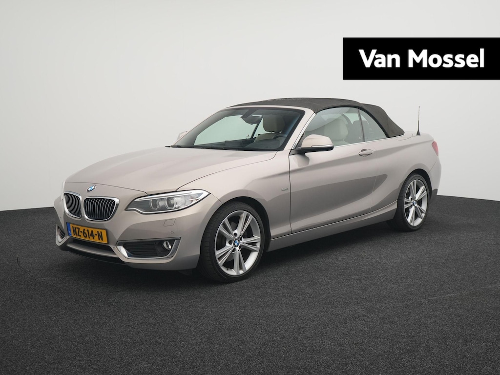 BMW 2-Serie Cabrio 220i High Executive | Cabriolet | HiFi System Harman Kardon | Automaat | Leder Dakota Canberrabeige | BI-xenon koplampen | Interieurlijsten Edelhoutuitvoering Fineline Pure | 12 Maanden BOVAG Garantie |