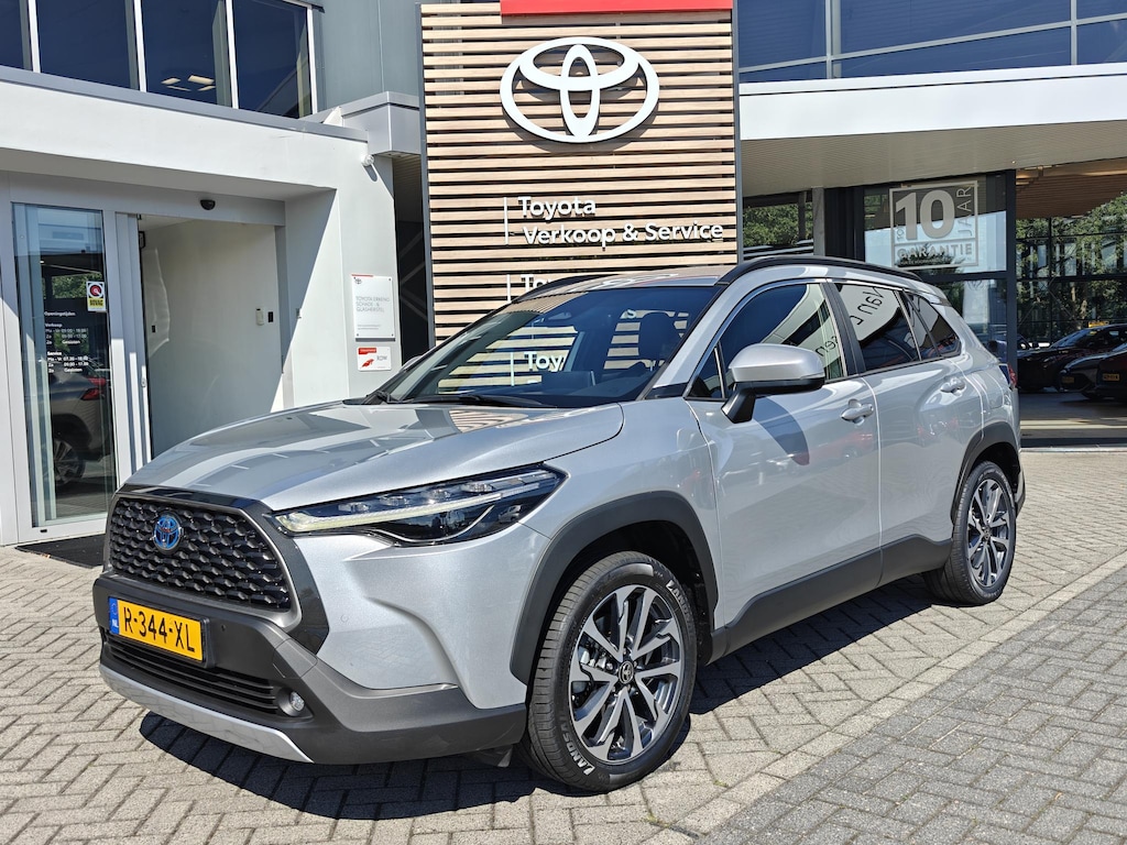 Toyota Corolla Cross 2.0 High Power Hybrid First Edition BLIND-SPOT EL-ACHTERKLEP LM-VELGEN KEYLESS PARK-SENSOREN STOELVERW DRAADLOOS-LADEN AD-CRUISE BLUETOOTH