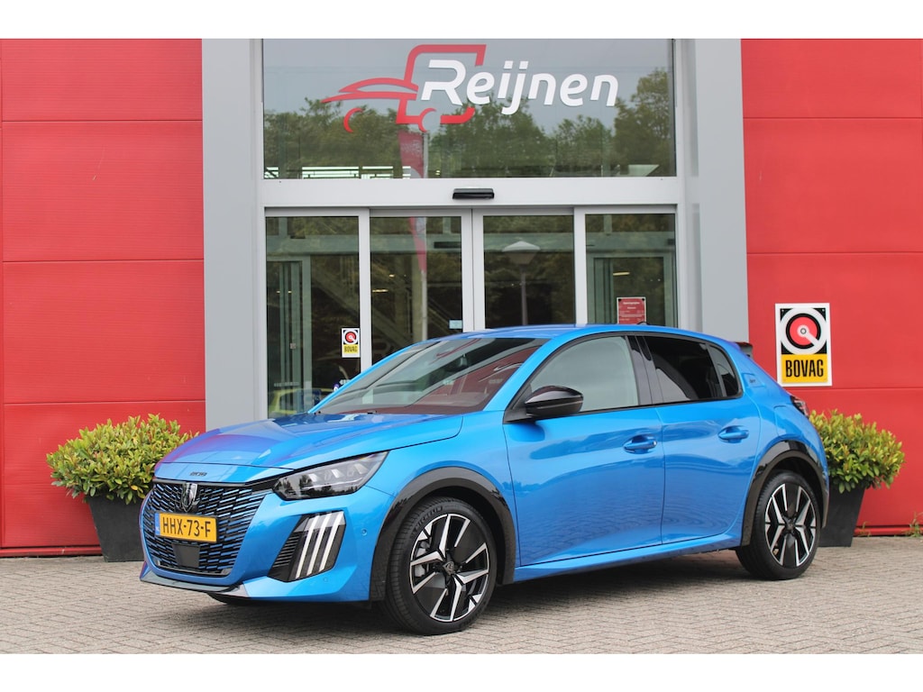 Peugeot 208 1.2 Hybrid 145PK AUTOMAAT GT | CAMERA VOOR + ACHTER | NAVIGATIE | DRAADLOZE APPLE CARPLAY/ANDROID AUTO | FULL LED KOPLAMPEN | LICHTMETALEN VELGEN 17" | DODEHOEK DETECTIE | DRAADLOZE TELEFOONLADER | KEYLESS ENTRY/START | DAB+ RADIO | ADAPTIVE CRUISE CONTROL | CLIMATE CONTROL |