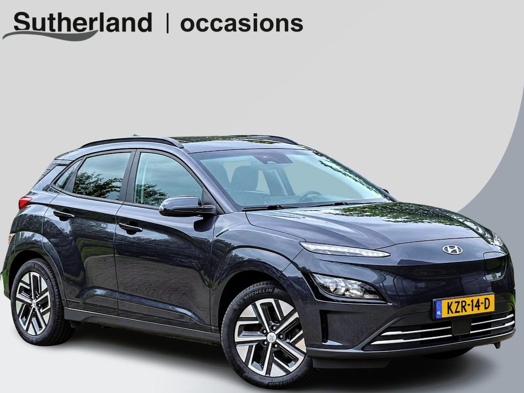Hyundai Kona Electric EV Fashion 64 kWh | 204 PK | SOH 95% | Adaptive cruise control | Achteruitrijcamera | Keyless entry | LED verlichting | DAB ontvanger | Bluetooth telefoonverbinding | Navigatie | Lichtmetalen velgen