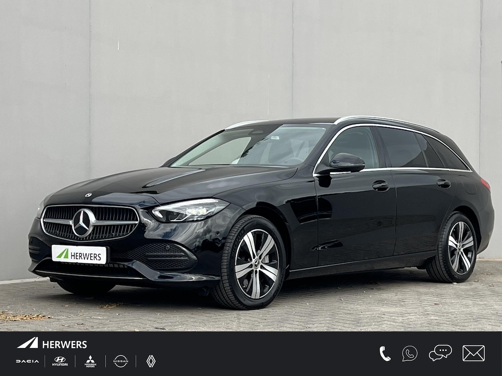 Mercedes-Benz C-klasse Estate 300 e Luxury Line / Dealer onderhouden / 1.800 kg elektrische trekhaak / Elektrische stoelen & Achterklep / Navi / Apple Carplay Android / 17" LM wielen /