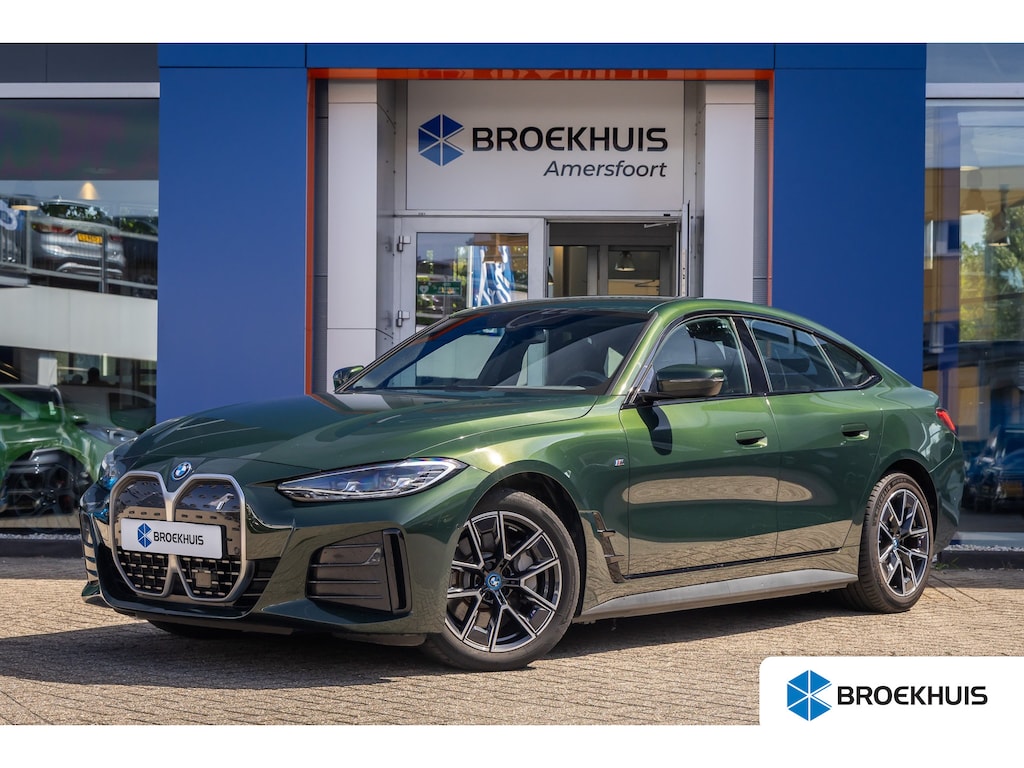BMW i4 eDrive35 High Executive 70 kWh | M-sport | Cruise adaptief | Camera | Elektrisch bedienbare achterklep | Keyless entry/start | Parkeer assistent | Apple Carplay/Android Auto | Achteruitrijcamera | Apple Carplay/Android Auto|telefoonintegratie premium | Cruise control adaptief met Stop&Go