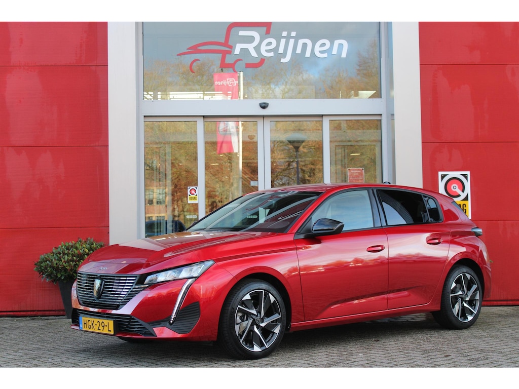 Peugeot 308 1.2 Hybrid 145PK AUTOMAAT ALLURE | AGR STOEL | STOEL EN STUUR VEWARMING | KEYLESS ENTRY/START | DRAADLOZE APPLE CARPLAY/ANDROID AUTO | NAVIGATIE | CLIMATE CONTROL | LICHTMETALEN VELGEN 17" | LED KOPLAMPEN | ACHTERUITRIJCAMERAA | ADAPTIVE CRUISE CONTROL | DRAADLOZE TELEFOONLADER |