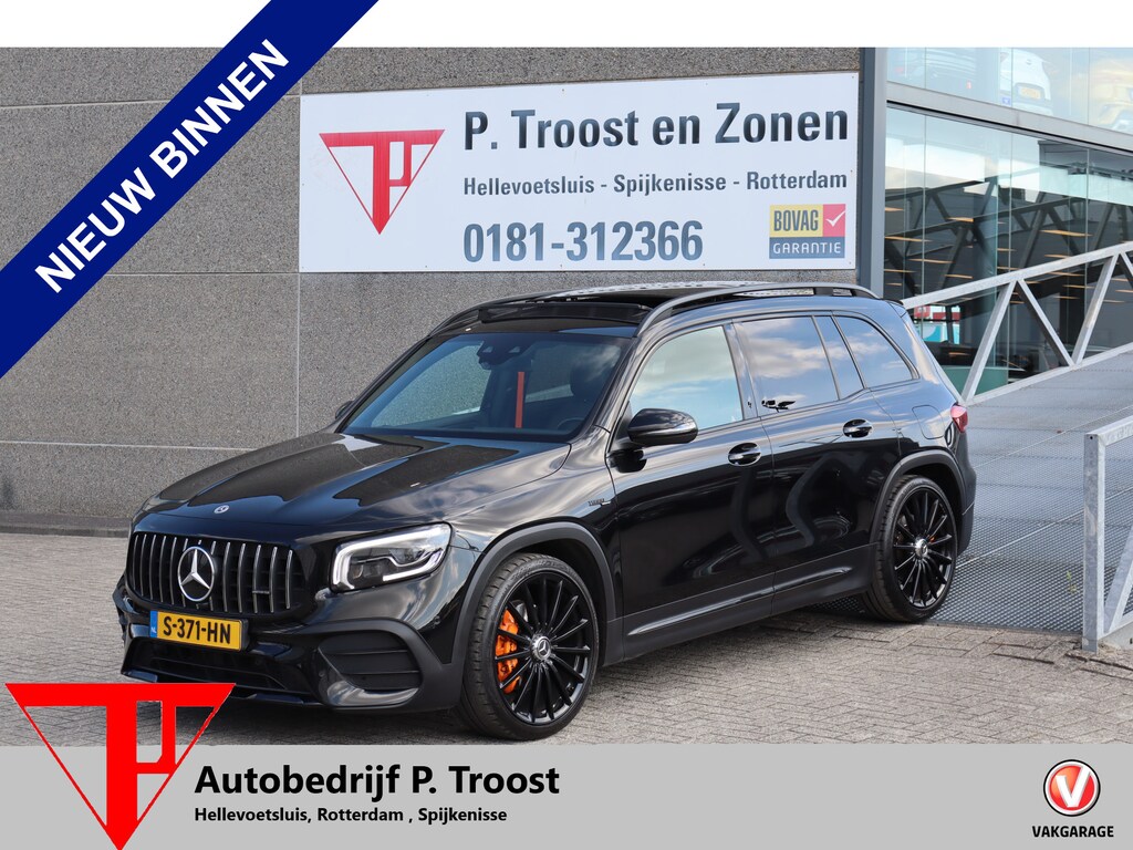 Mercedes-Benz GLB AMG 35 4MATIC Night pakket/Panoramadak/Stoelverwarming/Sfeerverlichting/ABC Kleppensysteem/Achteruitrijcamera/Apple carplay/21'' licht metaal/Elektrische achterklep/Oranje gordels!