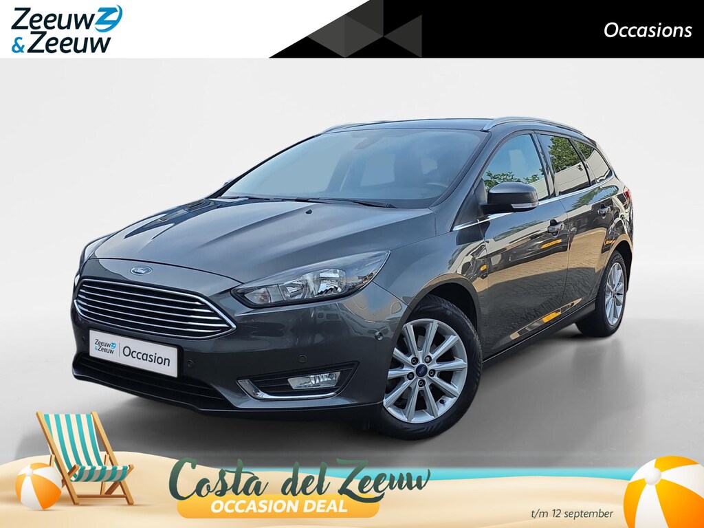 Ford Focus Wagon 1.0 Titanium | Goed onderhouden! | Apple Carplay/Android Auto | Cruise Control | Achteruitrijcamera | Climate Control | Parkeersensoren rondom | 12 maanden garantie! |