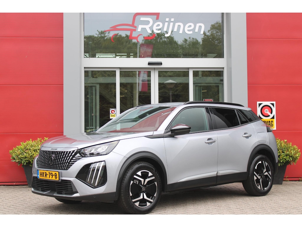Peugeot 2008 1.2 100PK ALLURE | NAVIGATIE | PARKEERSENSOREN VOOR + ACHTER | KEYLESS ENTRY/START | LICHTMETALEN VELGEN 17" | DRAADLOZE APPLE CARPLAY/ANDROID AUTO | DRAADLOZE TELEFOONLADER | CRUISE CONTROL | DAB + RADIO | LED KOPLAMPEN |
