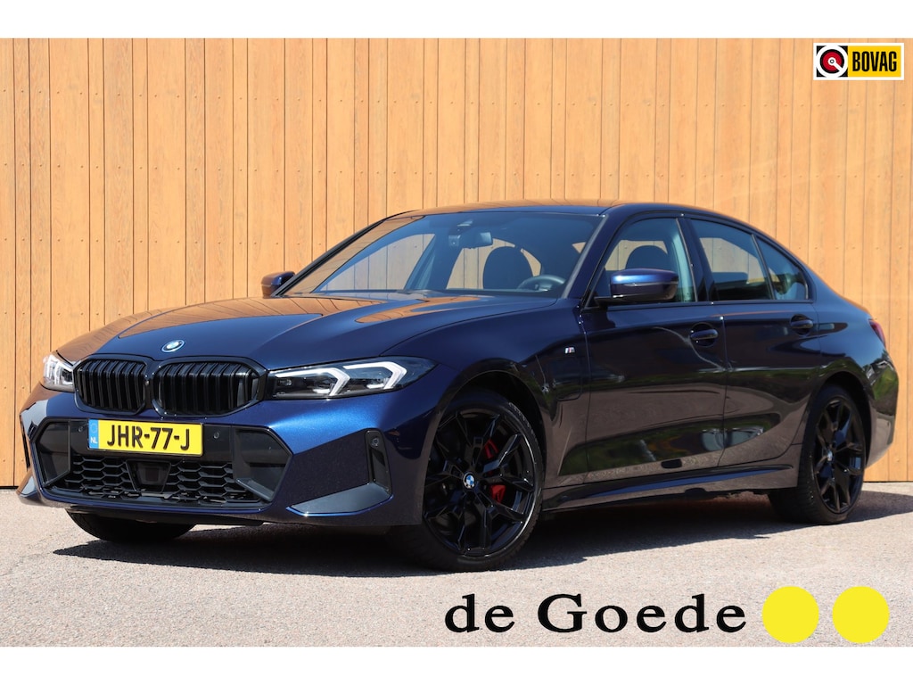 BMW 3-Serie 330e xDrive M-sport Pro Tansanitblau HUD ambiance verl. leer+vw stuurverw el.klep camera's