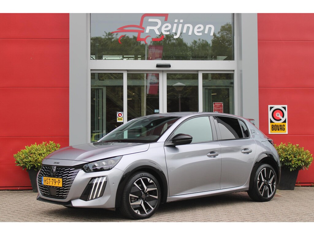 Peugeot 208 1.2 Hybrid 145PK AUTOMAAT GT | CAMERA VOOR + ACHTER | NAVIGATIE | DRAADLOZE APPLE CARPLAY/ANDROID AUTO | FULL LED KOPLAMPEN | LICHTMETALEN VELGEN 17" | DODEHOEK DETECTIE | DRAADLOZE TELEFOONLADER | KEYLESS ENTRY/START | DAB+ RADIO | ADAPTIVE CRUISE CONTROL | CLIMATE CONTROL |