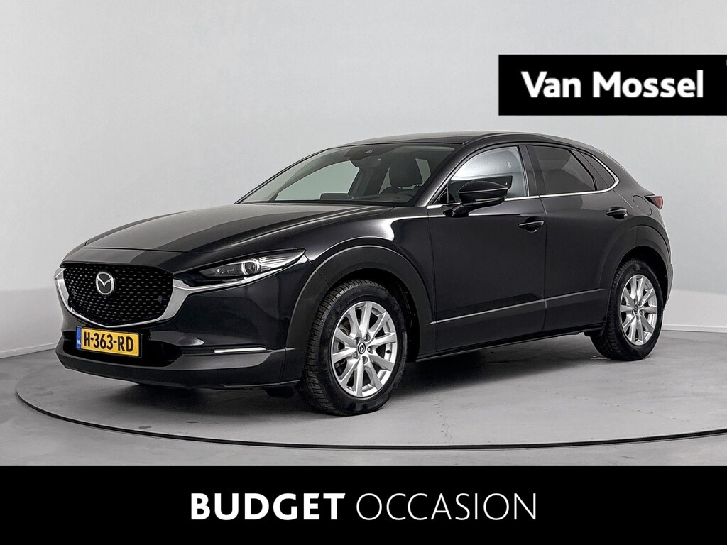 Mazda CX-30 2.0 e-SkyActiv-X M Hybrid Luxury 185 PK Airco | Achteruitrij Camera | Stoelverwarming | Bluetooth | Cruise Control Adaptief | Dodehoekdetectie | Elektrisch Bedienbare Achterklep | Elektrisch Verstelbare Bestuurdersstoel | Head-Up Display | LED Koplampen | Lederen Bekleding | Lederen Stuurwiel | Lichtmetalen Velgen | Navigatiesysteem | Parkeersensoren Voor en Achter | Stuurwiel Verwarmbaar |