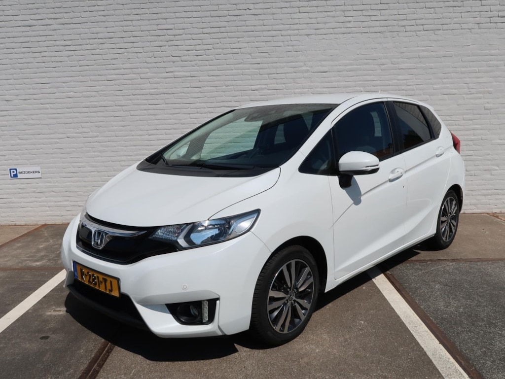 Honda Jazz 1.3 i-VTEC 102pk Elegance I Navi I Climate Control I Camera I PDC V + A I Trekhaak I Verwarm. Voorstoelen I LED Dagrij I