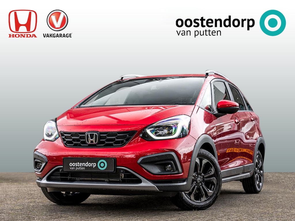 Honda Jazz 1.5 Full Hybrid Automaat Advance Crosstar | Premium Crystal Red | 8 jaar garantie | Nieuwe auto | Adaptieve cruise | Climate control | Carplay