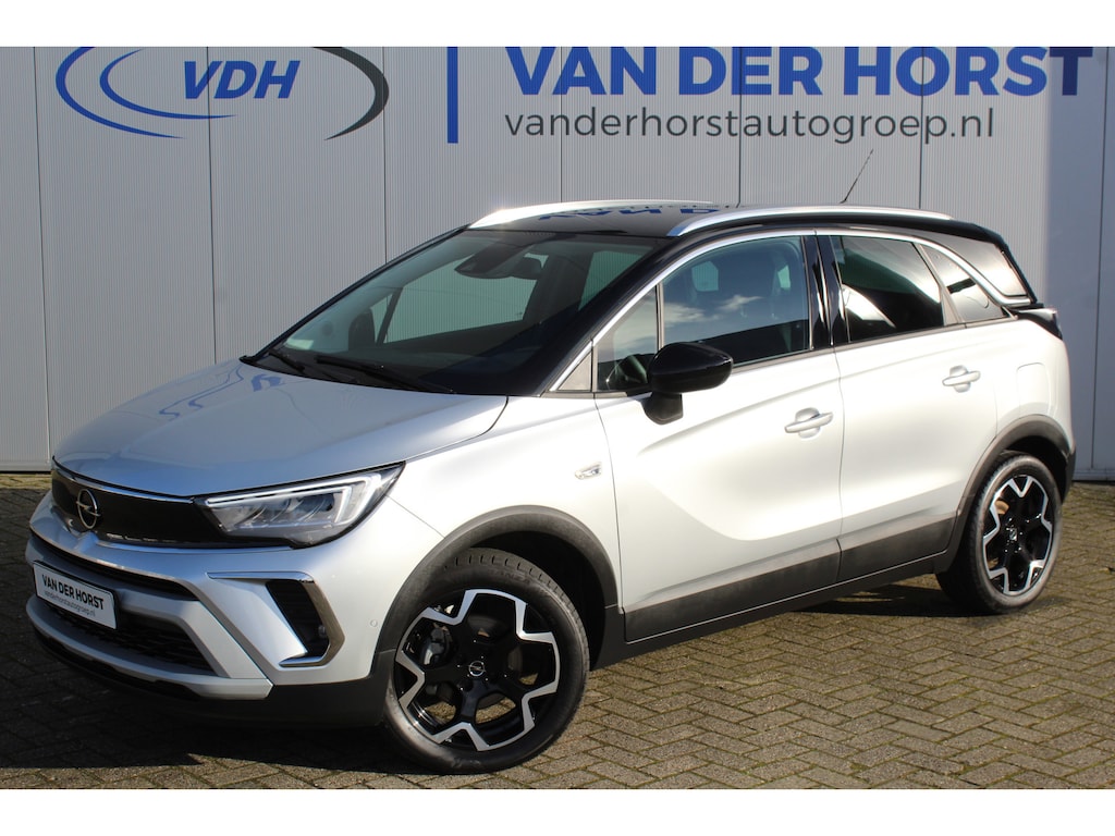 Opel Crossland 1.2-110pk Turbo 'Elegance'. Mooie en luxe hoogzitter ! Volautm. airco dual, cruise control, camera, comfortst., LM wielen, navigatie, telefoonvoorb., lane- en side assist, pdc v+a,  LED verl., trekhaak etc.