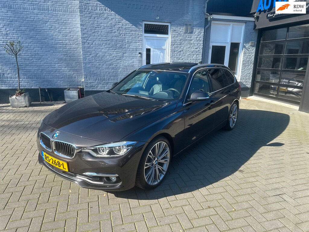 BMW 3-Serie Touring 330i | PANO | ELEK. TREKHAAK | MEMORY STOEL | HARMAN KARDON |