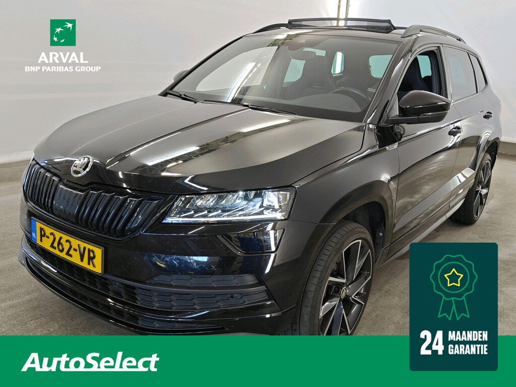 Skoda Karoq 1.5 TSI 150pk Automaat Sportline Business | Panoramadak | Stuur- en Stoelverwarming | Camera | PDC V+A | CarPlay | 19"