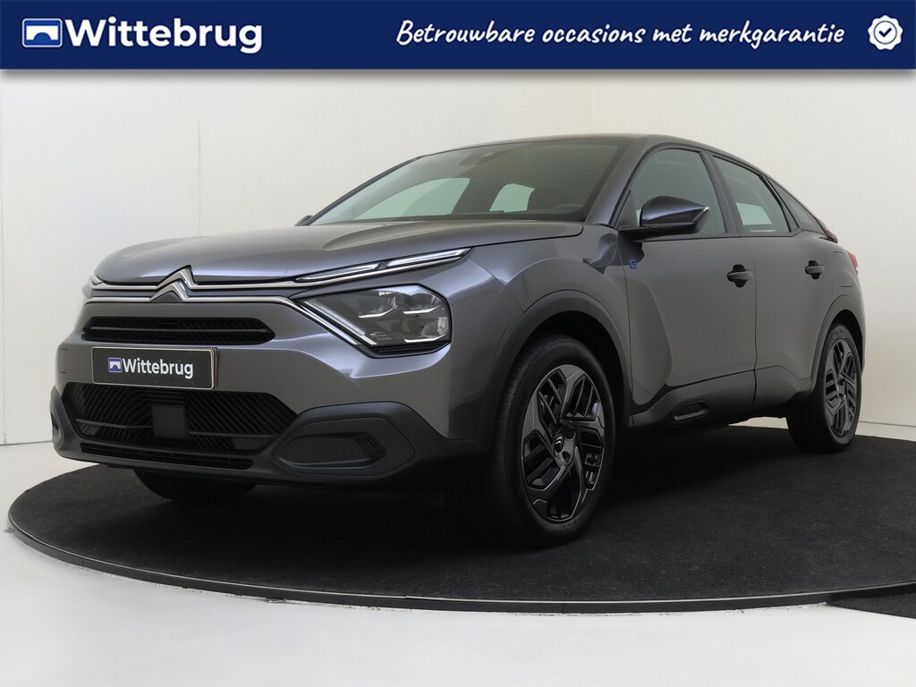 Citroën E-C4 You 50 kWh I AUTOMAAT I ACHTERUITRIJCAMERA I ACHTERUITRIJSENSOREN I L.M. VELGEN I