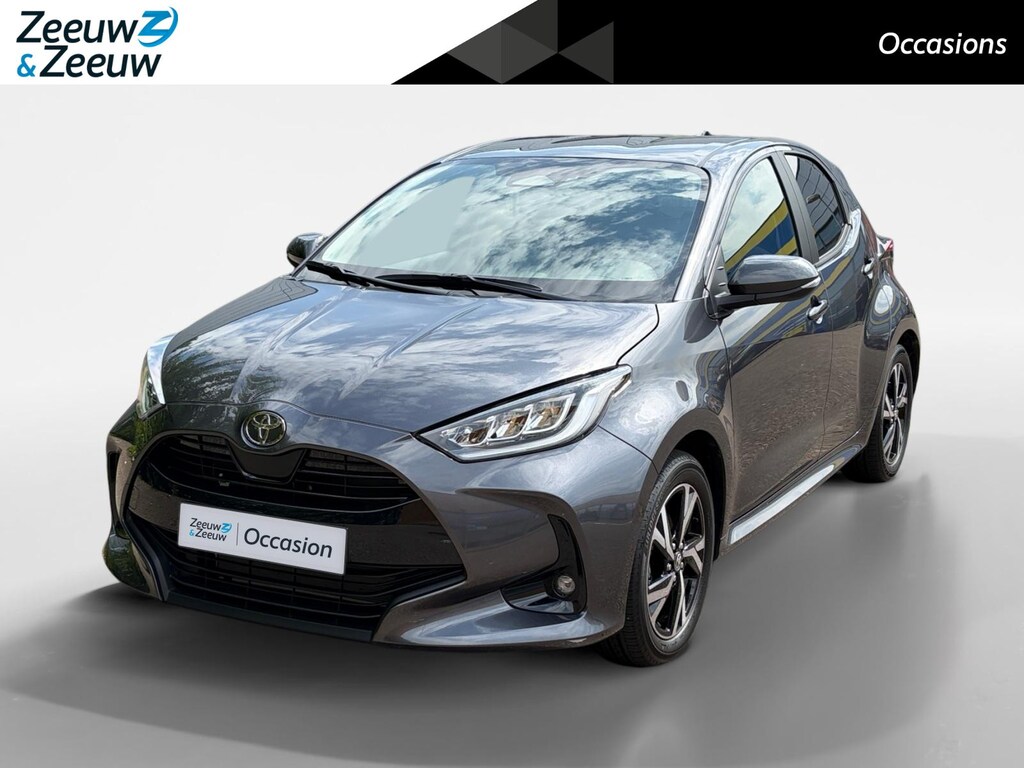 Toyota Yaris 1.5 Hybrid 115 Comfort Apple Carplay/Android Auto , cruise control adaptief en stuurhulp , climate , lm velgen , tel , usb , camera .