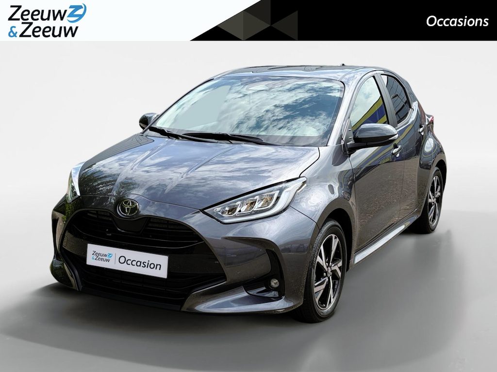 Toyota Yaris 1.5 Hybrid 115 Comfort Apple Carplay/Android Auto , cruise control adaptief en stuurhulp , climate , lm velgen , tel , usb , camera .