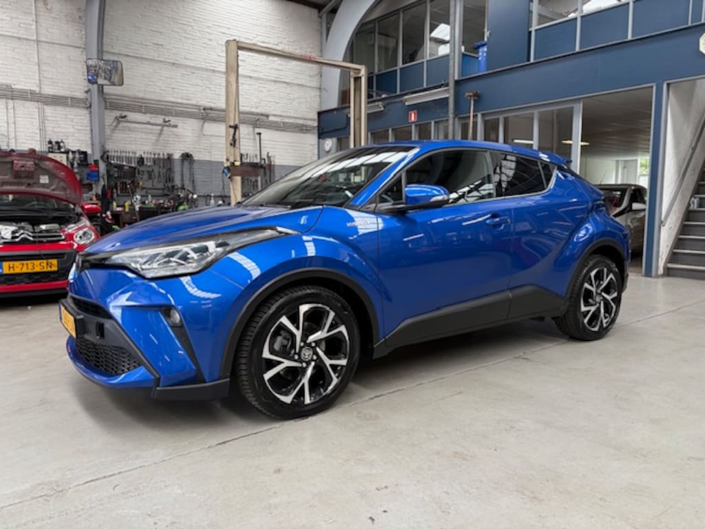 Toyota C-HR / C-HR+ 1.8 Hybrid 122pk CVT Business Plus | Apple carplay / Android auto | Navigatie | Camera | Stoelverw. | JBL | All season banden | NAP | Rijklaar prijs!