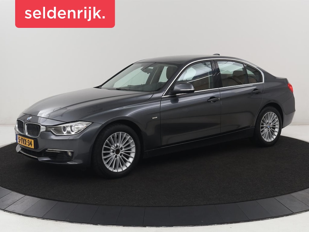 BMW 3-Serie 320i High Executive | Leder | Sportstoelen | Stoelverwarming | Full LED | Cruise control | Park assist | Climate control | Bluetooth |