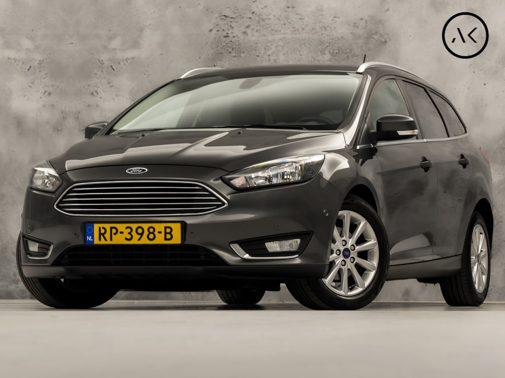 Ford Focus Wagon 1.0 Titanium Sport (APPLE CARPLAY, NAVIGATIE, CLIMATE, GETINT GLAS, SPORTSTOELEN, KEYLESS, PARKEERSENSOREN, NIEUWE APK, NIEUWSTAAT)