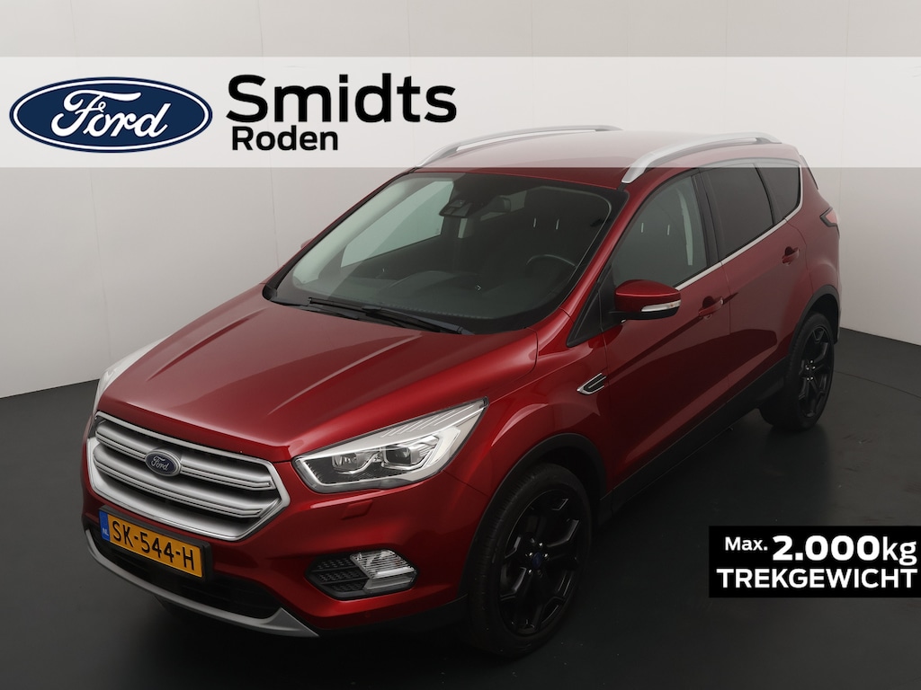 Ford Kuga 150PK EcoBoost Titanium | Xenon | Trekhaak | Elektr. achterklep | Adapt.cruise | Half leder | Camera |