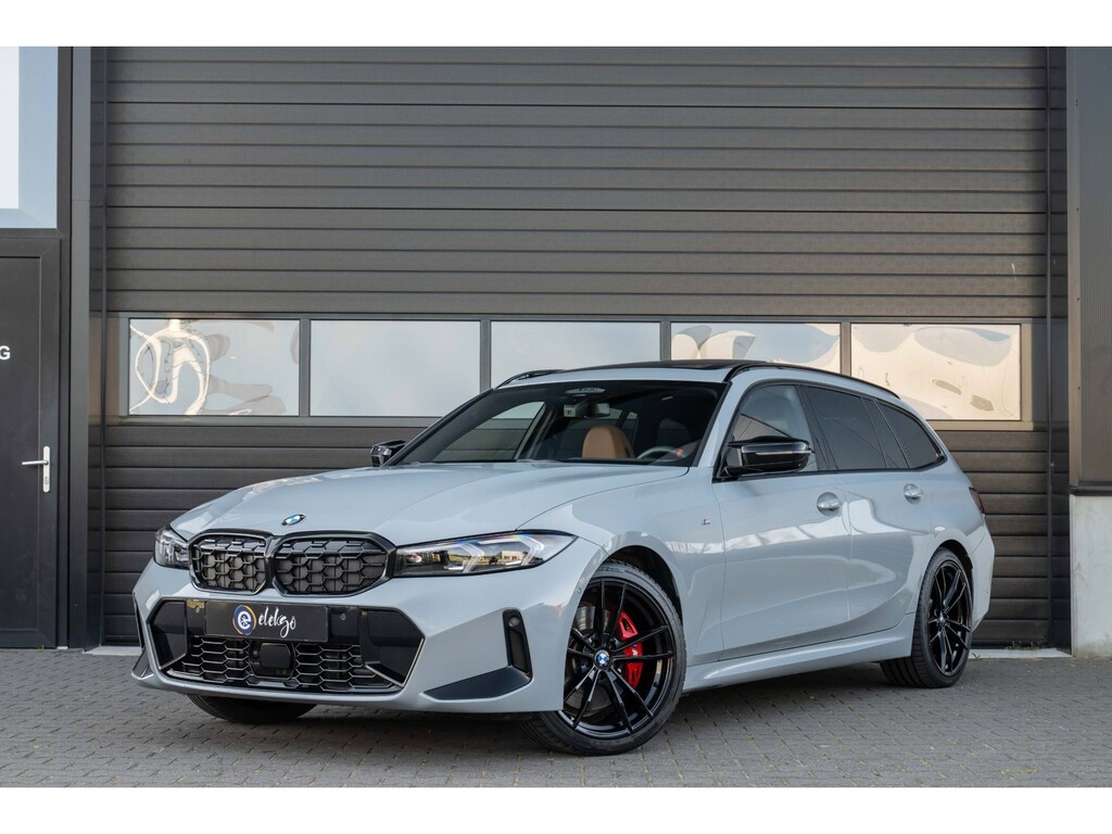 BMW 3-Serie Touring M340i xDrive Vol|Pano|Trekhaak|Harman-Kardon|HuD|Carbon|