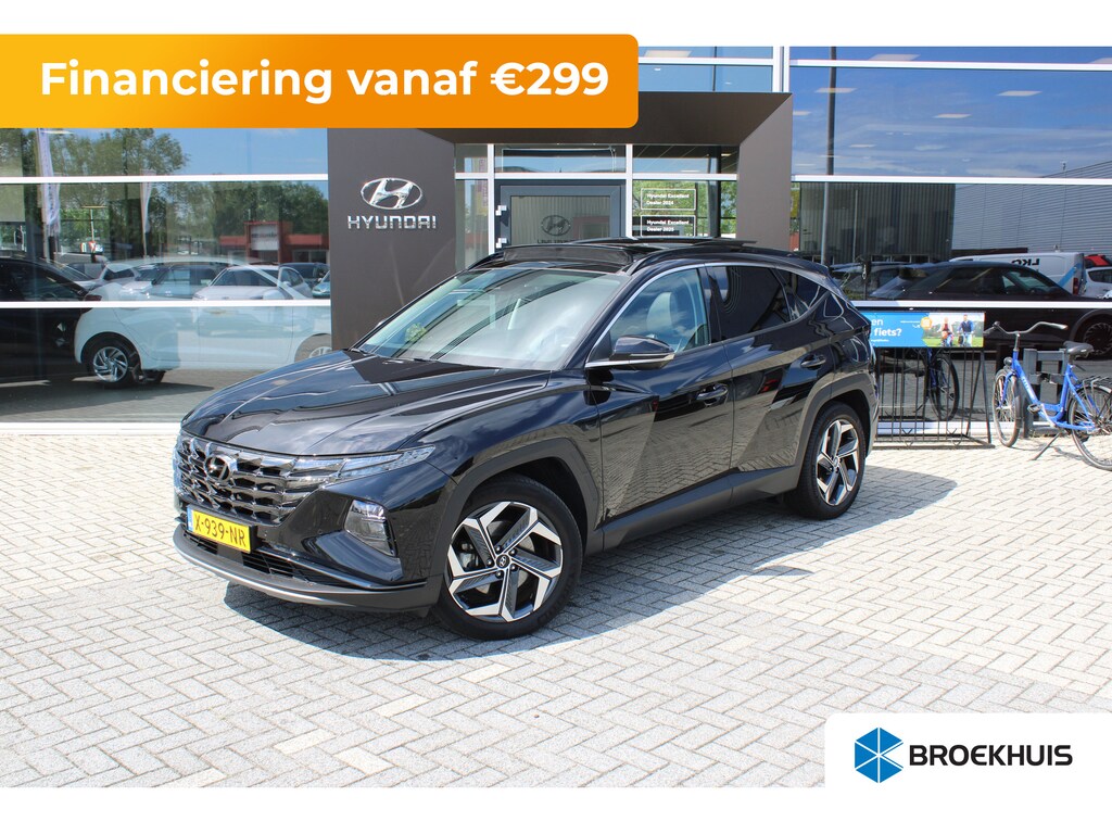 Hyundai Tucson 1.6 T-GDI 265pk PHEV Premium Sky 4WD | Schuifkanteldak | 360 camera | Lederen bekleding | | Achterbank verwarmd | Achteruitrij assistent | Airco (automatisch)