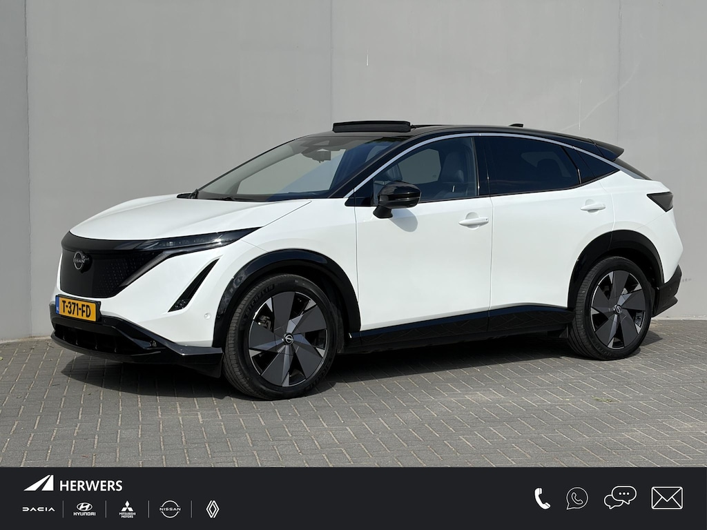Nissan Ariya Evolve 91 kWh / SOH 99% / Stoelverwarming voor en achter / Schuif-kantel dak / Stoelventilatie / Stuurverwarming / 100% dealer onderhouden / Elektrisch verstelbare stoelen met geheugen / Elektrische achterklep / Adaptieve cruise control