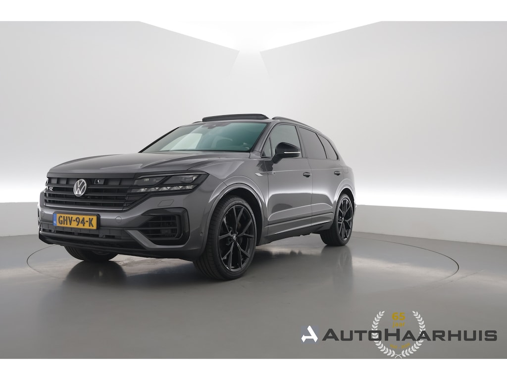 Volkswagen Touareg 3.0 TSI 462pk eHybrid 4MOTION R | Rijklaar! | Elek. Trekhaak | Luchtvering | Ventilatie | S/K-Dak | 22'' | HUD | Memory+Leder | Dynaudio | Stoel-Stuurverw. | 360*+PDC | Sfeerverl. | Rijmodi | Dodehoek | BlackStyle V