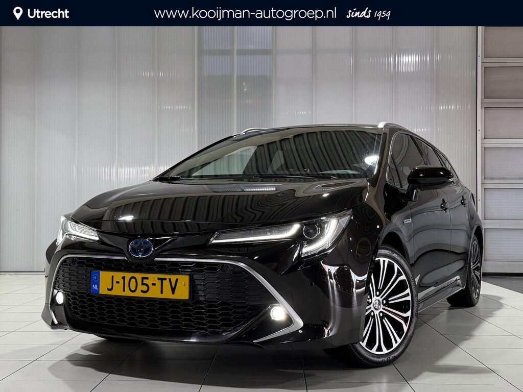 Toyota Corolla Touring Sports 1.8 Hybrid Executive Trekhaak met afneembare kogel , HUD , Stoelverwarming , 360 Graden Parkeersensoren , Dak Dragers