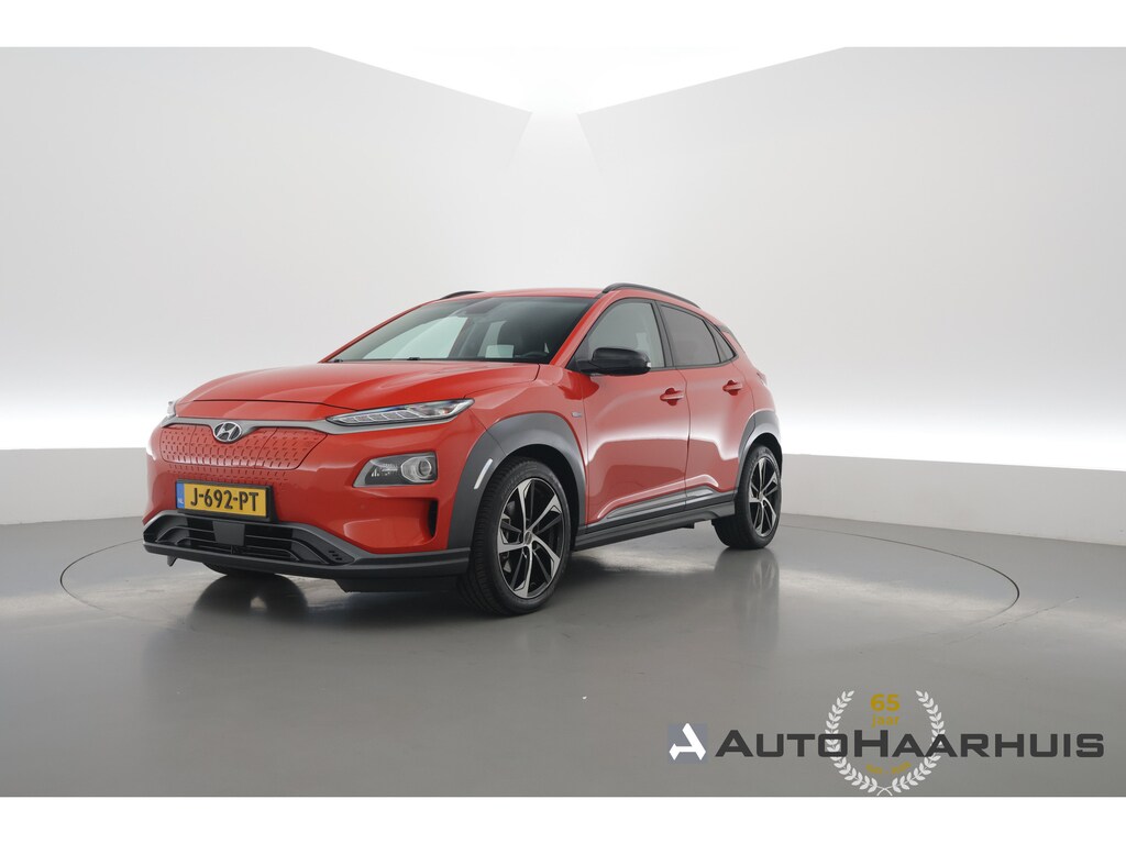 Hyundai Kona Electric EV Premium 64 kWh | Rijklaar ! |SOH 96.6% | Warmtepomp | HUD | Krell | Adapt. Cruise | Camera | Stoel- Stuurverw. | Keyless | Leder