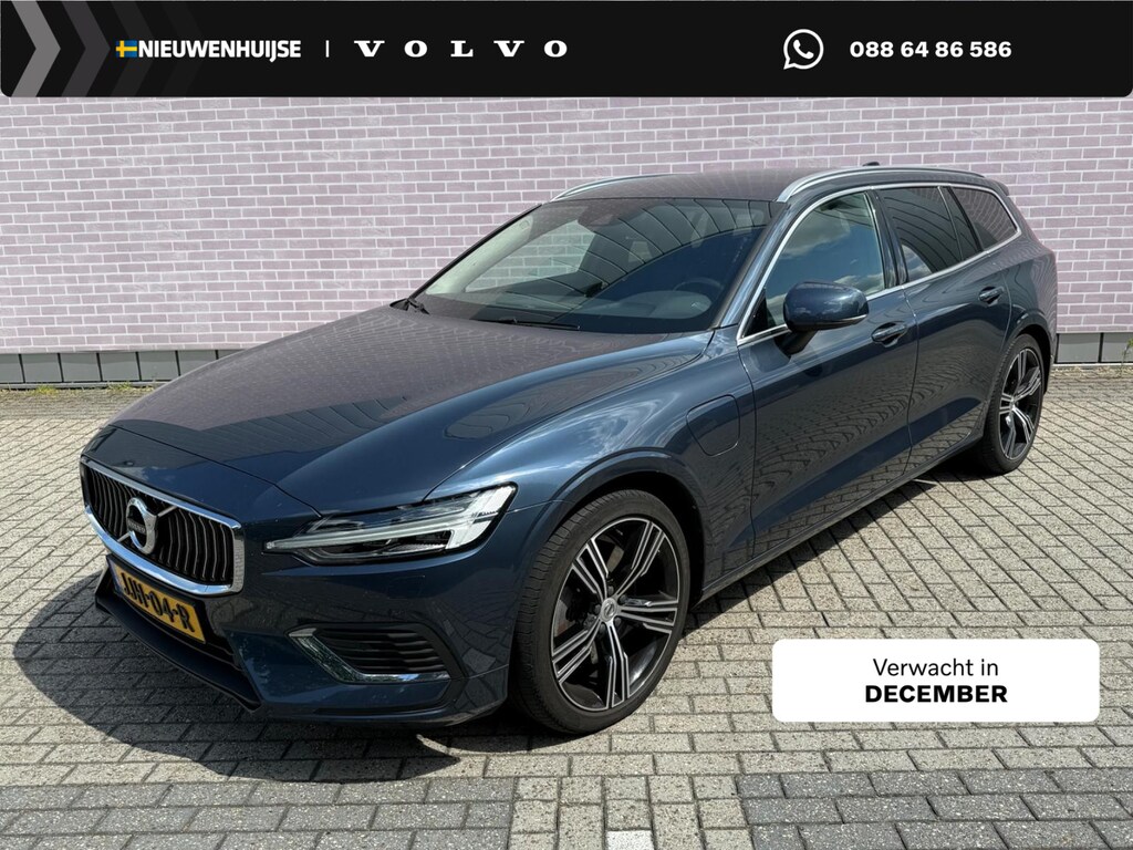 Volvo V60 2.0 T6 Recharge AWD Inscription | Long Range | Trekhaak | Harman Kardon Audio | Achteruitrijcamera | Parkeersensoren | Keyless Entry | Elektrische Achterklep | Elektrisch Verstelbare Voorstoelen | Stoelverwarming | Lichtmetalen Velgen 19 inch | Navigatie | Apple Carplay | Android Auto