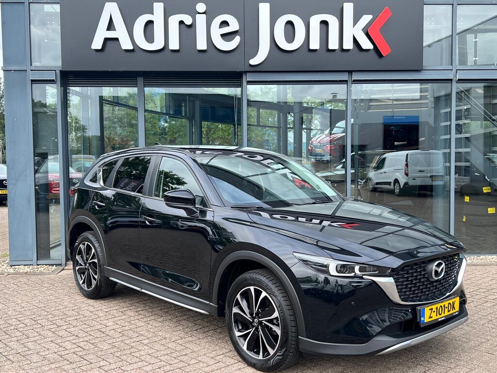 Mazda CX-5 2.0 e-SkyActiv-G M Hybrid 165 Newground AUTOMAAT | TREKHAAK | 360gr. CAMERA | NAVIGATIE | APPLE + ANDROID | HEAD-UP DISPLAY | 19"LM VELGEN | EL.A. KLEP |