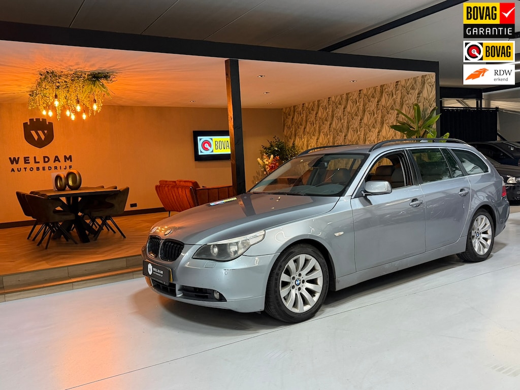 BMW 5-Serie Touring 520d High Executive Navi Leder Trekhaak PDC Clima