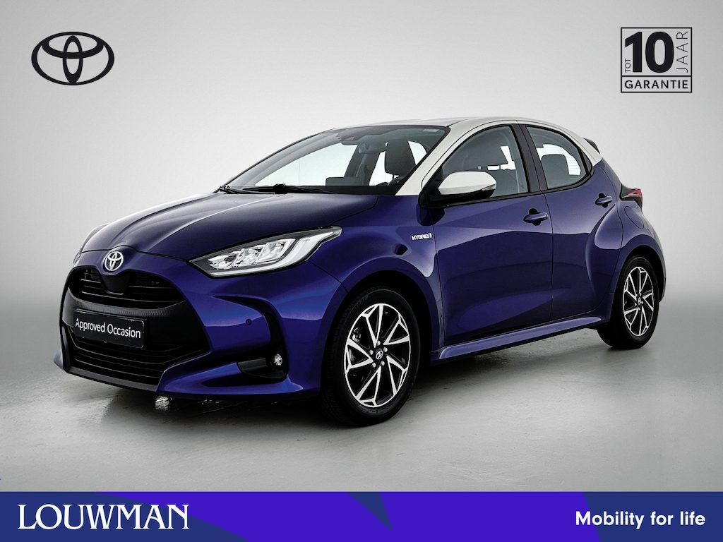Toyota Yaris 1.5 Hybrid Style + | BTW voertuig | Head-Up Display | Dodehoek detectie | Parkeersensoren voor+achter | Draadloze telefoonlader | Navigatie | Apple CarPlay/Android Auto |