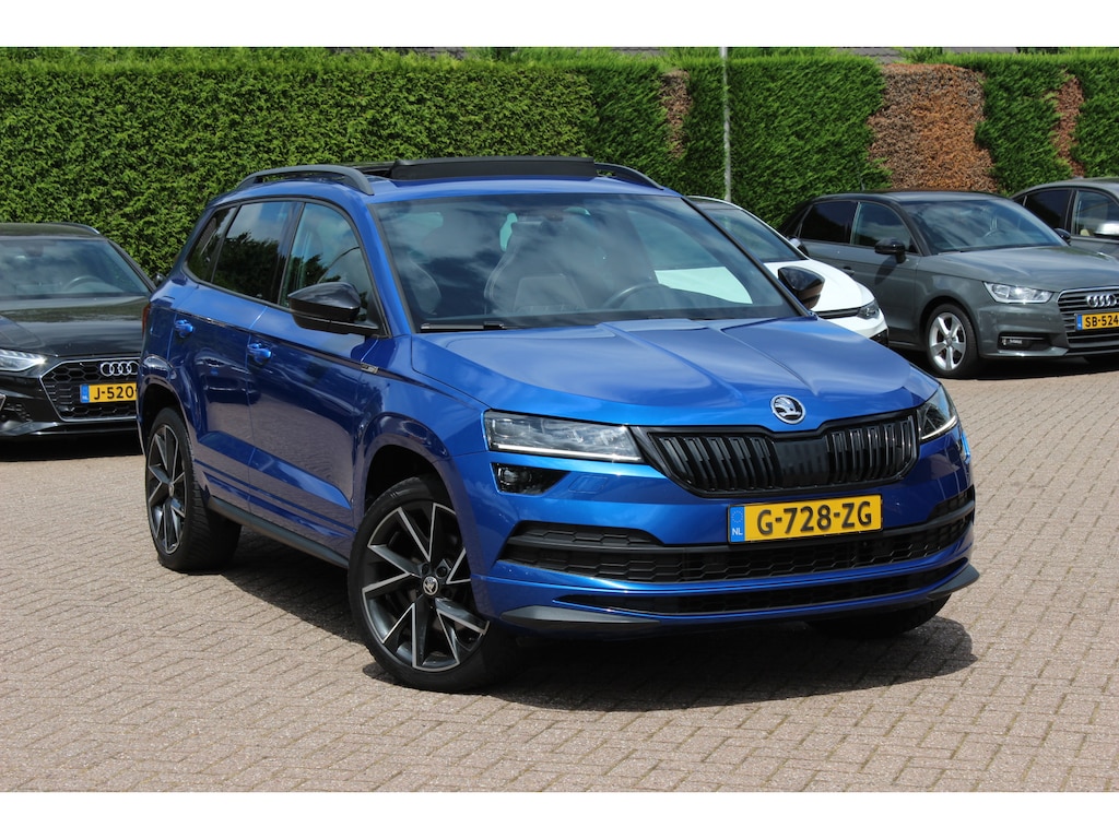 Skoda Karoq 2.0 TSI 4x4 Sportline Business / NL Auto! / Trekhaak / Panoramadak / Camera / CarPlay / Keyless / 19'' / DAB / Cruise Control