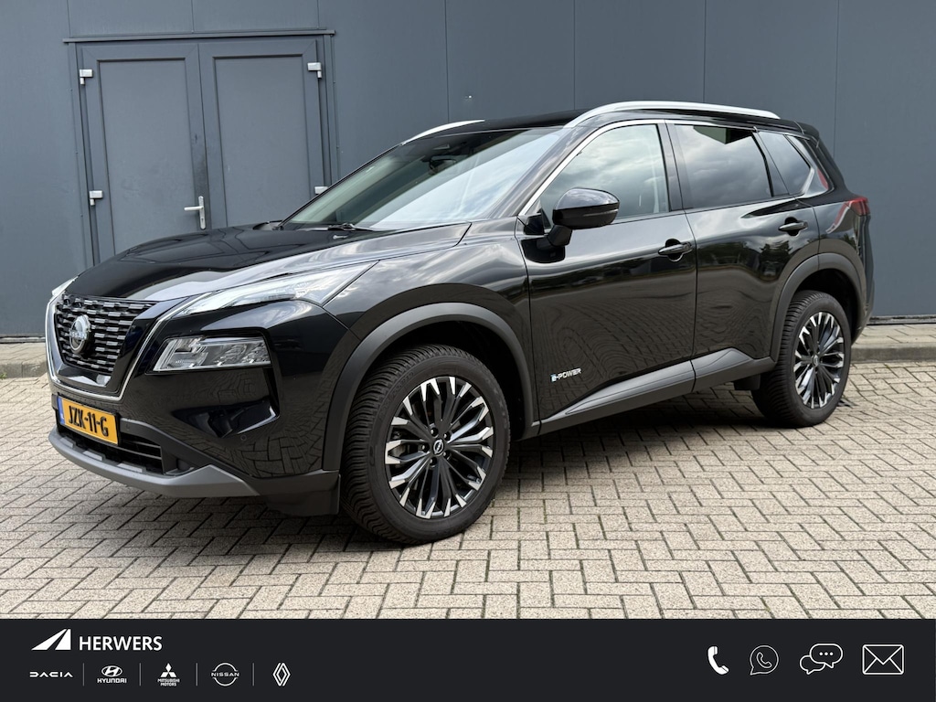 Nissan X-Trail 1.5 e-Power Tekna Automaat / Fabrieksgarantie tot 05-2028<100.000 / Dealer onderhouden / All Season banden / Head Up Display / Adaptief cruise control / Stuur-, Stoel & Achterbank verwarming / Elektrische achterklep /