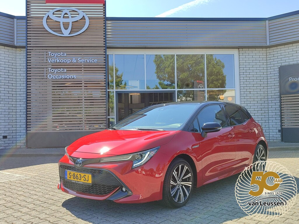 Toyota Corolla 1.8 HYBRID STYLE BI-TONE STOELVERW TREKHAAK KEYLESS 17'' LM-VELGEN APPLE/ANDROID CLIMA AD-CRUISE PRIVACY GLASS