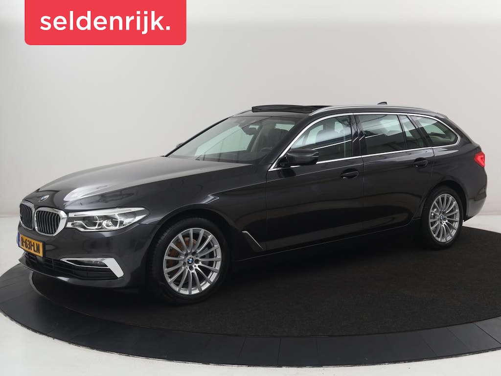 BMW 5-Serie Touring 520i High Executive | Panoramadak | Trekhaak | Head-Up | Stoelventilatie | Stoel & Stuurverwarming | Adaptive cruise | Navigatie | DAB+ | Carplay | Sfeerverlichting | Park assist | Climate control