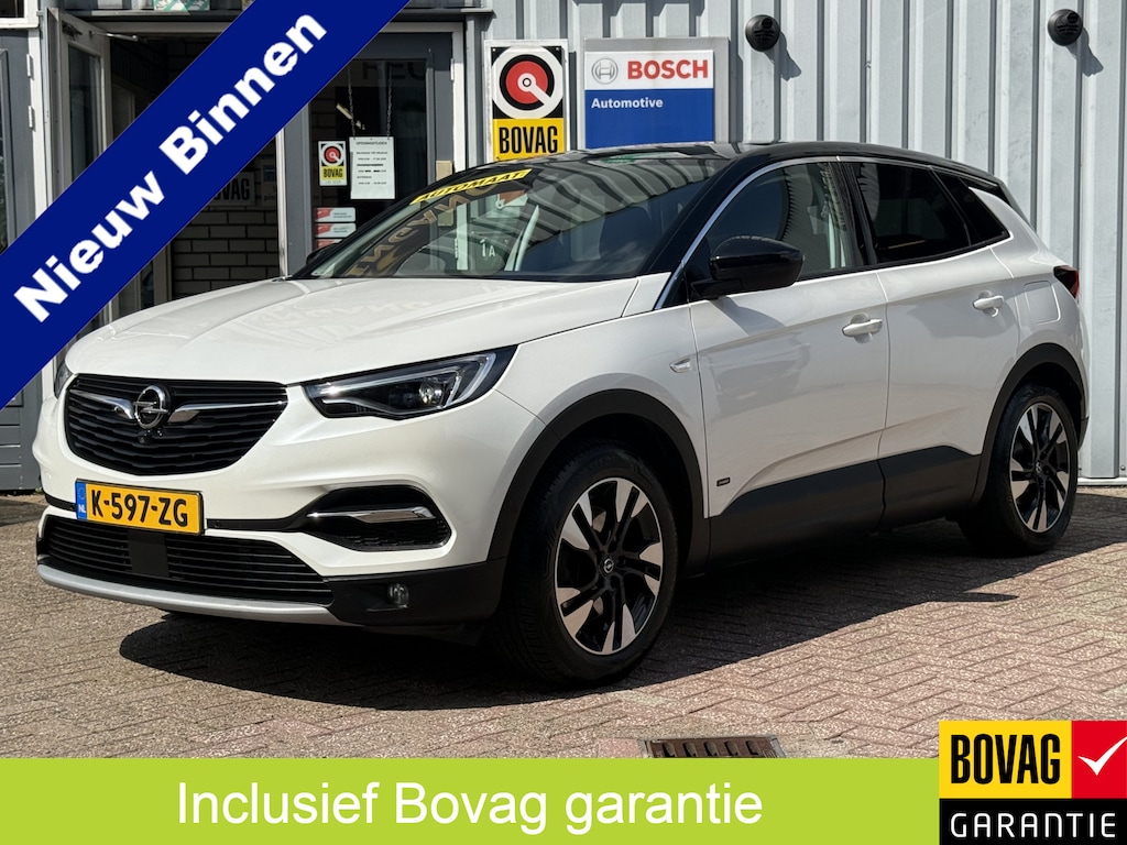 Opel Grandland X . 1.6 Turbo Hybrid Business Elegance 181pk | TREKHAAK | CAMERA | NAVI | FULL LED | PARELMOER WIT |