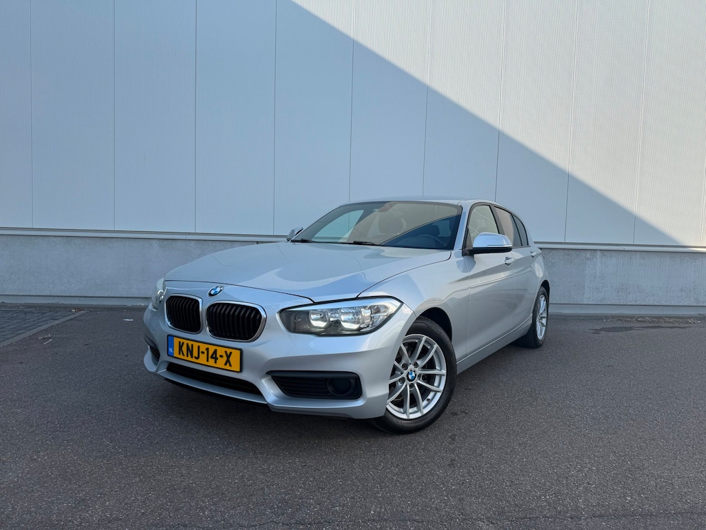 BMW 1-Serie 116i - Airco / Navi / Cruise / PDC / Leder / Elektr. ramen / Lm velgen